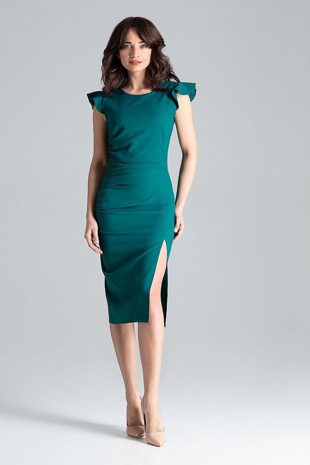 Cocktail dress in teal green with ruffled cap sleeves and side slit, fitted knee length.