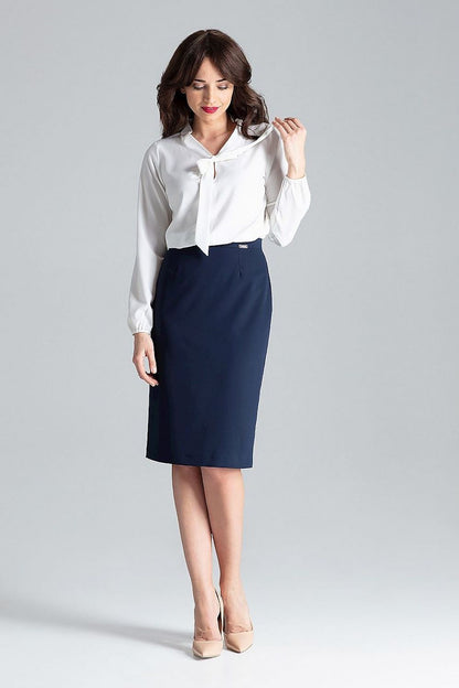 White tie-neck blouse with long sleeves and tied neckline