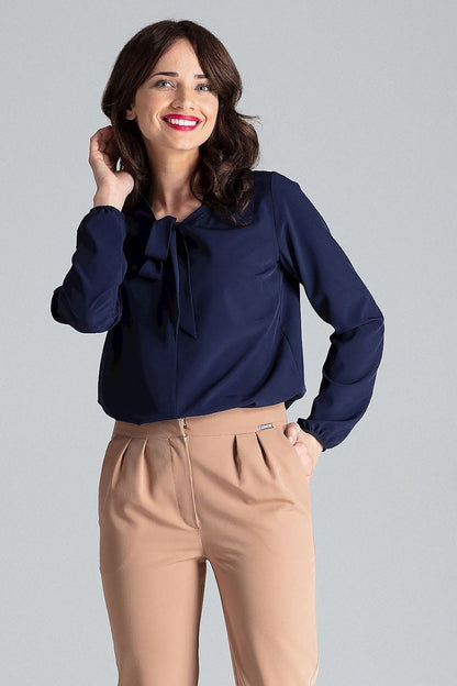 Navy tie-neck blouse with long sleeves and bow at collar