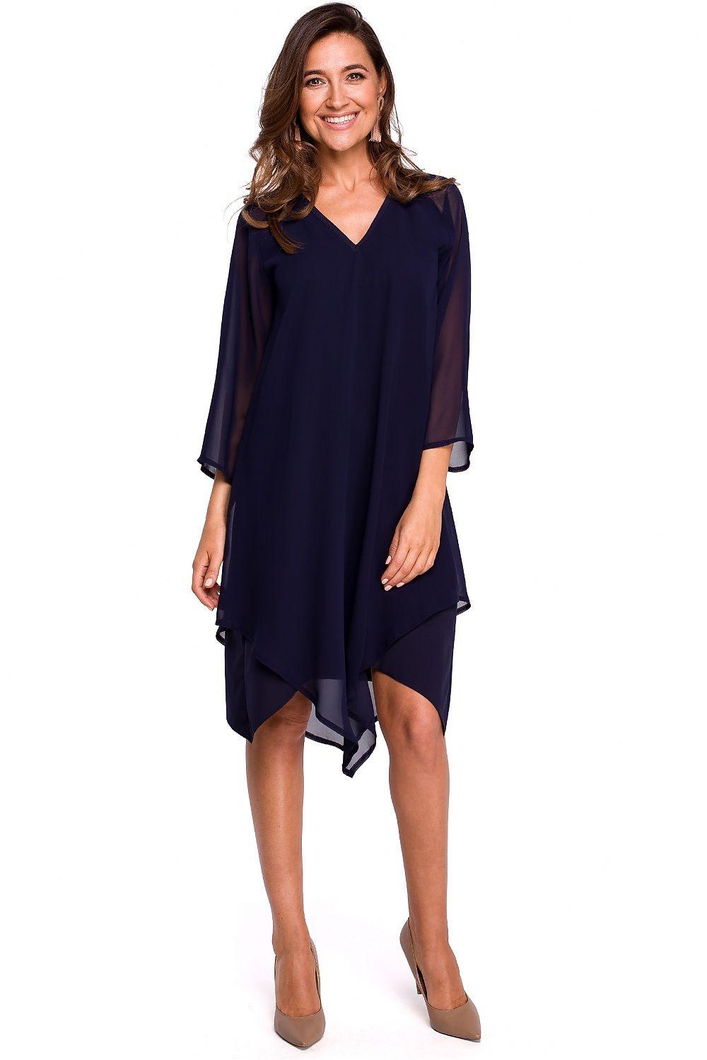 Navy blue cocktail dress with sheer 3/4 sleeves and asymmetrical hem