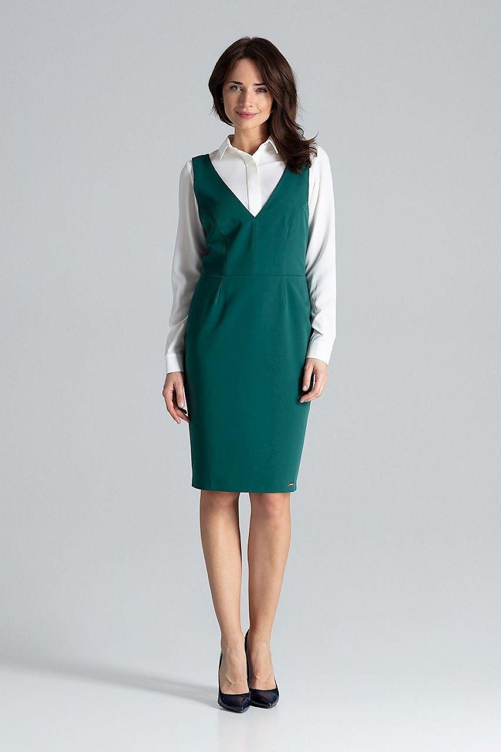 Green daydress with white long sleeves, V-neck, fitted knee-length pinafore.