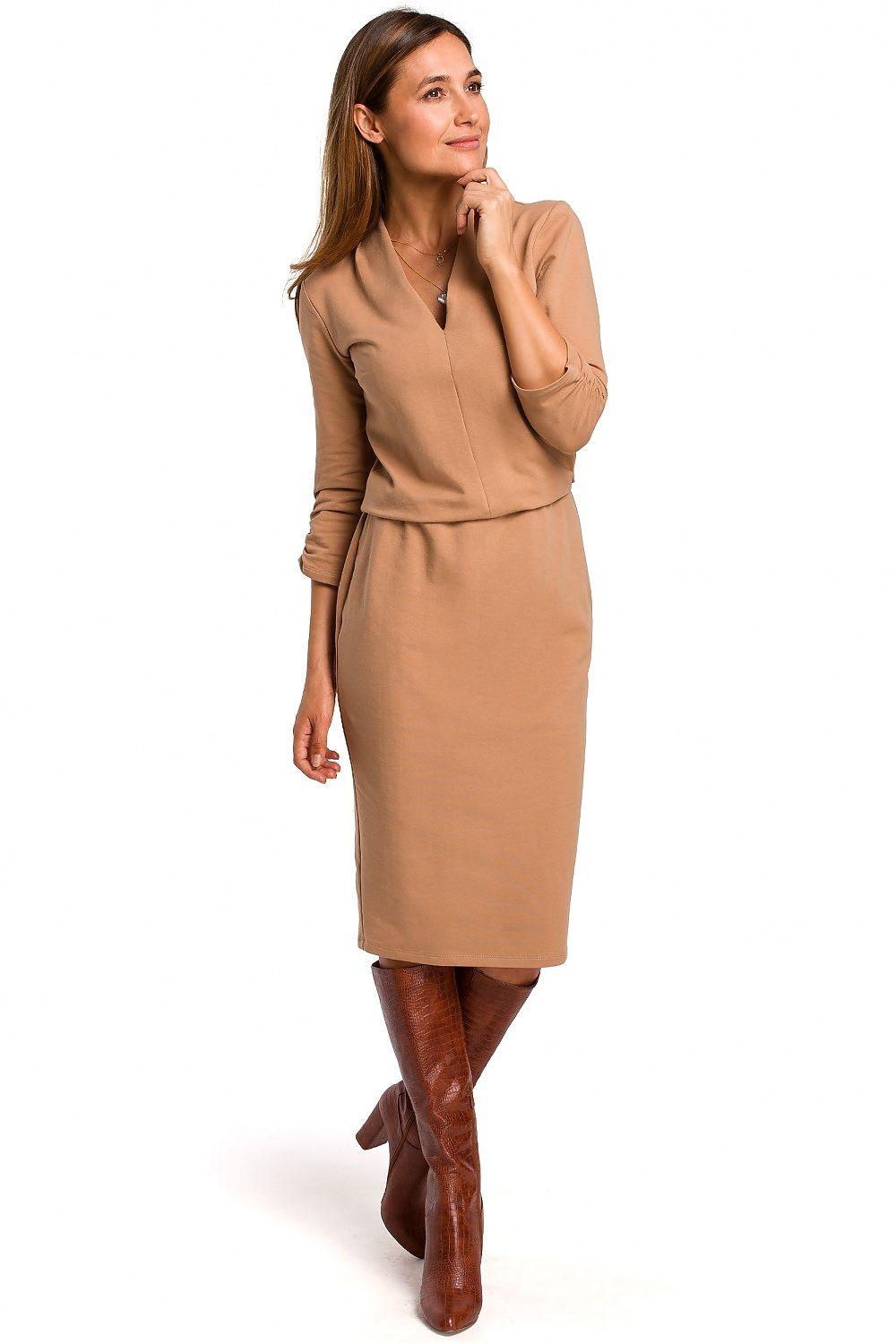 Beige daydress with V-neck, 3/4 sleeves, waist belt, midi length.