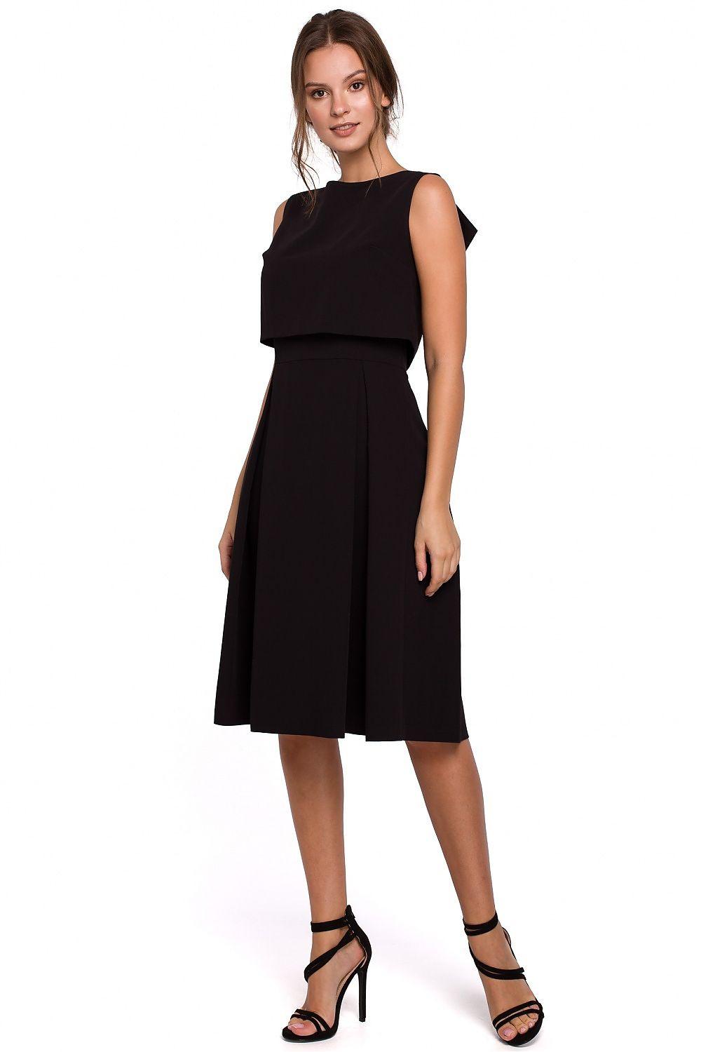 Black sleeveless evening dress with fitted waist and flared skirt