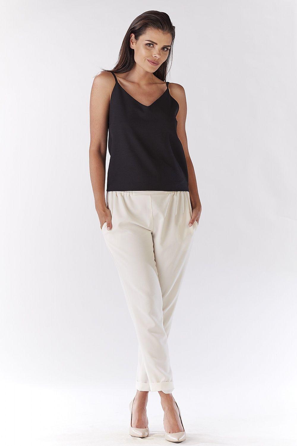 Beige tapered ankle-length trousers with cuffed hem and front pleat