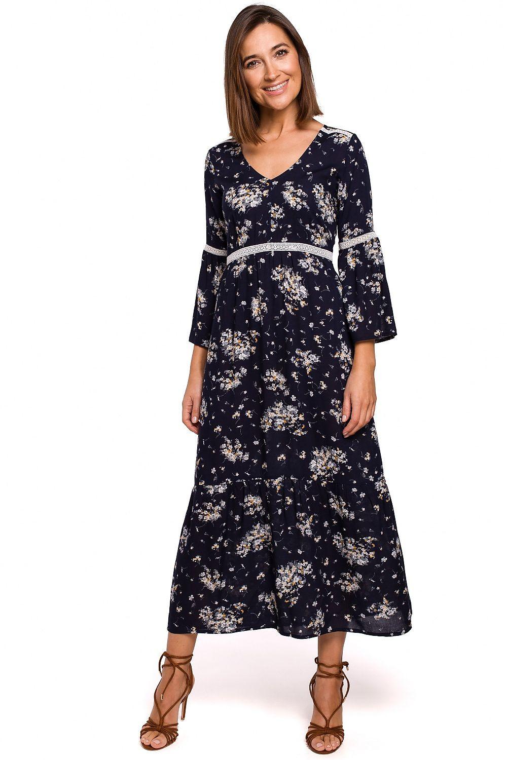 Navy floral daydress with V-neck, three-quarter sleeves, and tied waist belt