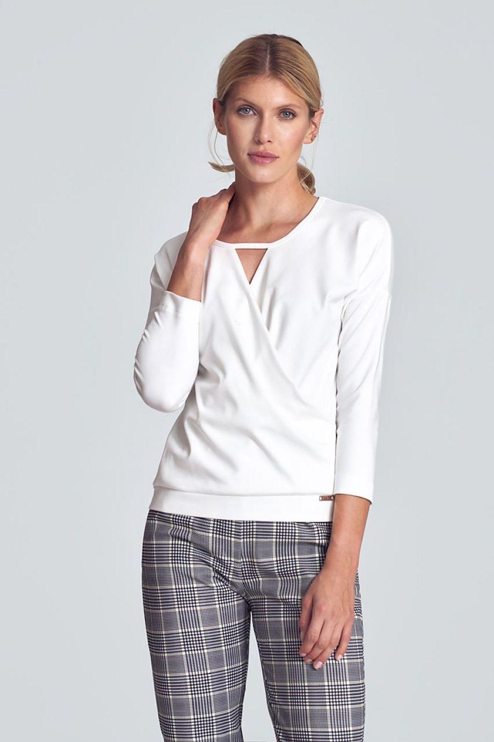 White blouse with V-neck wrap-style front and three-quarter sleeves