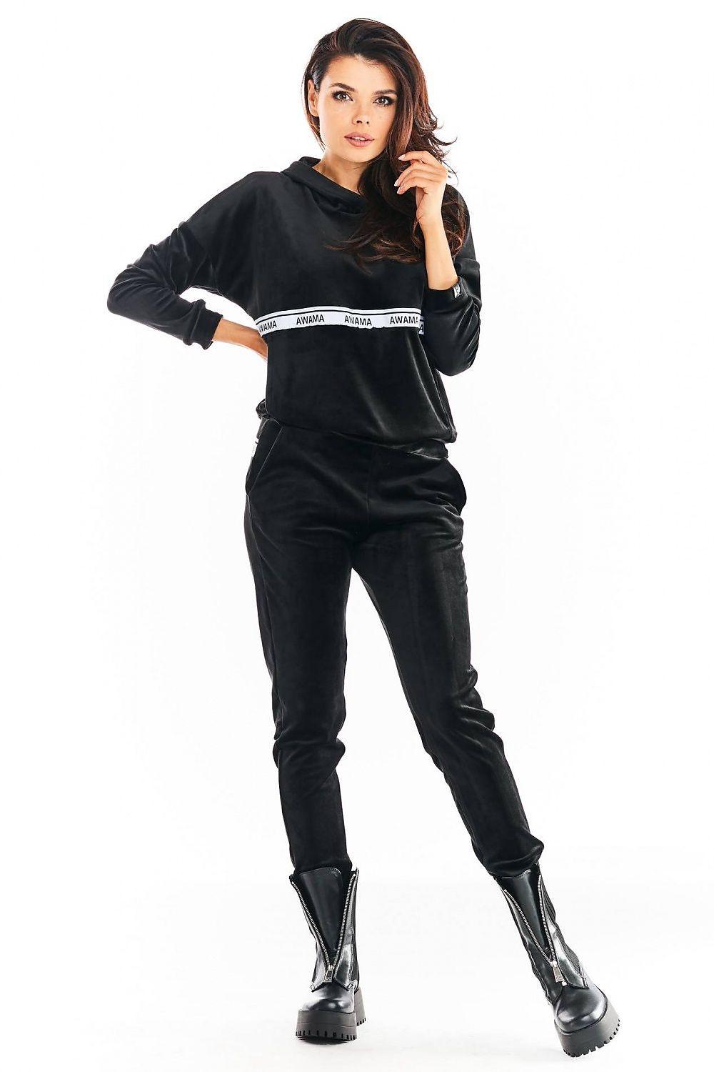 Black velvet tracksuit trousers with elastic cuffs and logo waistband