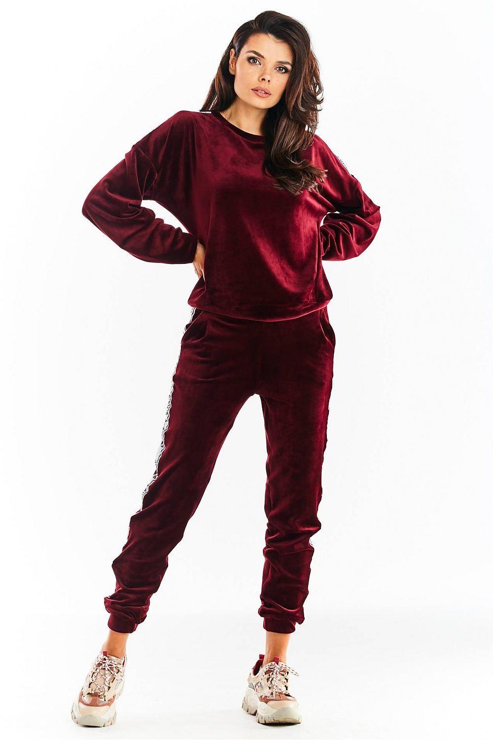 Red velvet tracksuit trousers with elastic cuffs and side stripe