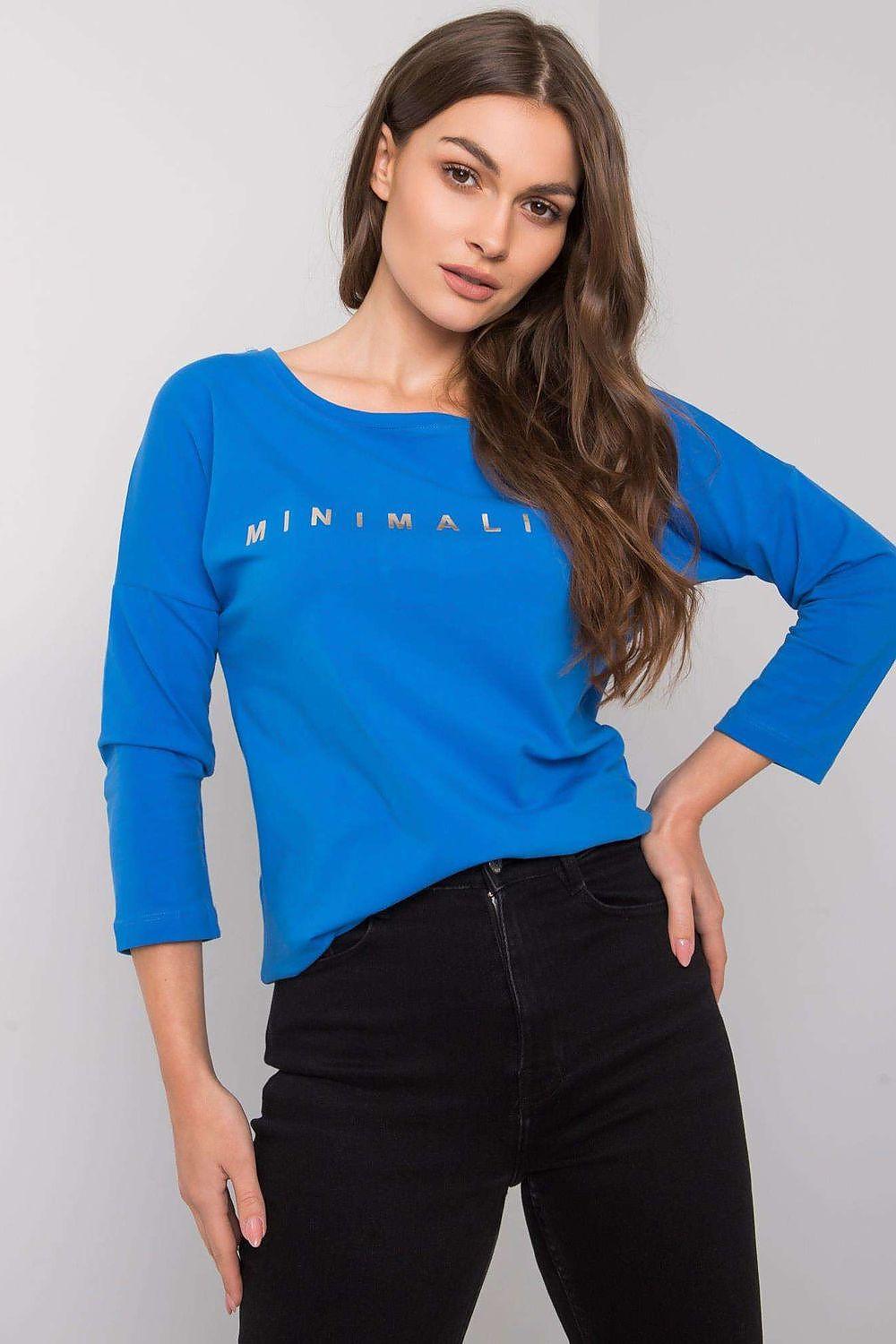Blue crew-neck blouse with 3/4 sleeves and minimal front graphic