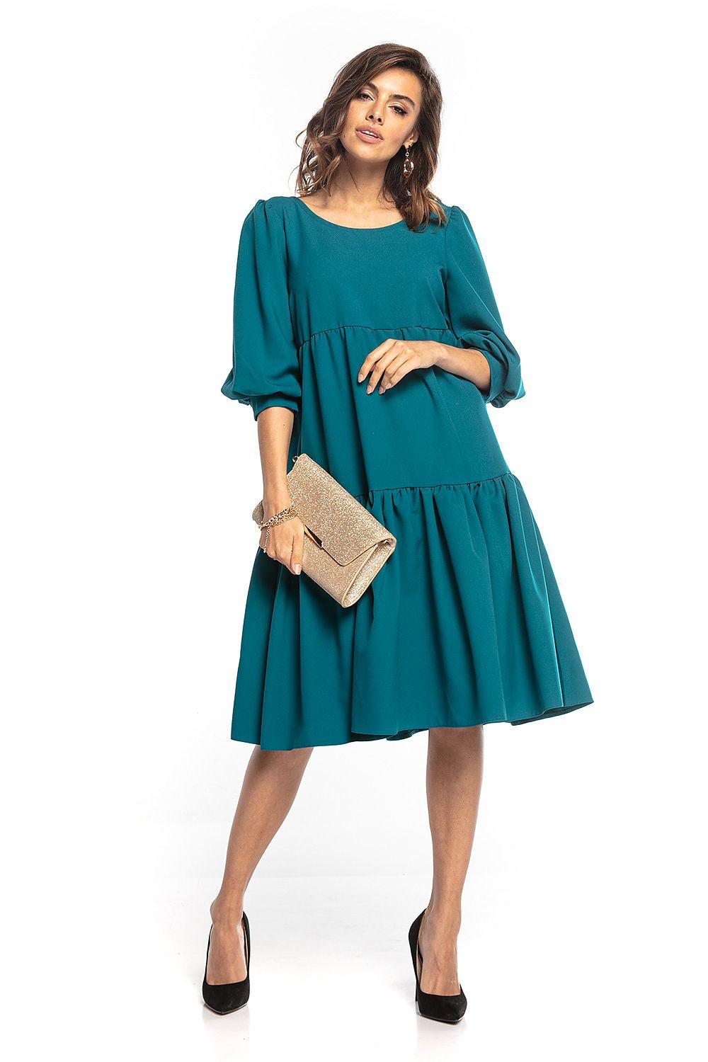 Teal tiered daydress with round neckline and 3/4 puff sleeves, loose fit