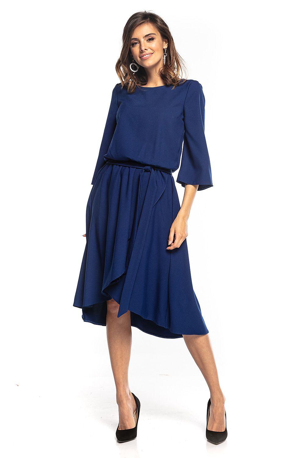 Navy blue daydress with 3/4 sleeves, fitted waist belt, and layered asymmetrical hem