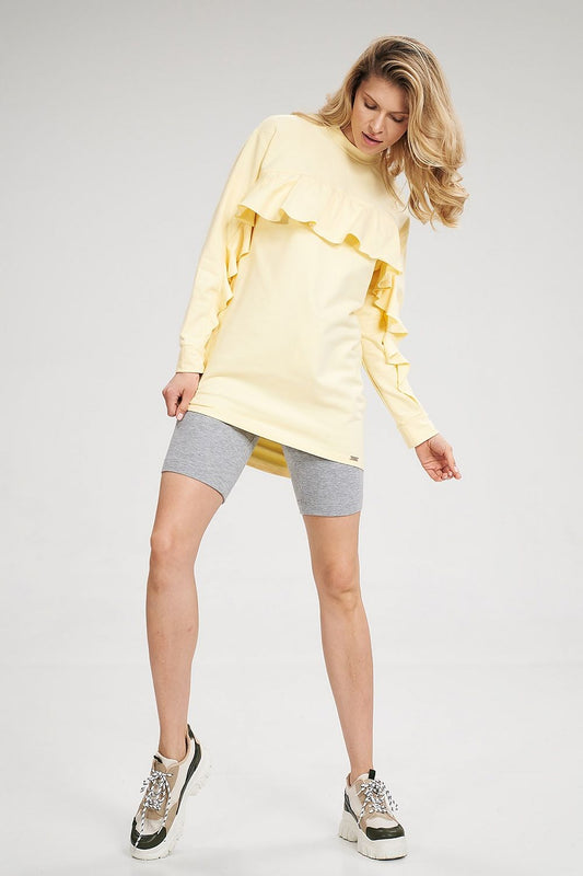 Yellow ruffle long-sleeve tunic with layered shoulder detail and side drape