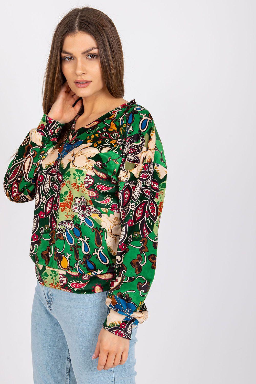 Green patterned long-sleeve blouse with crew neckline and relaxed fit