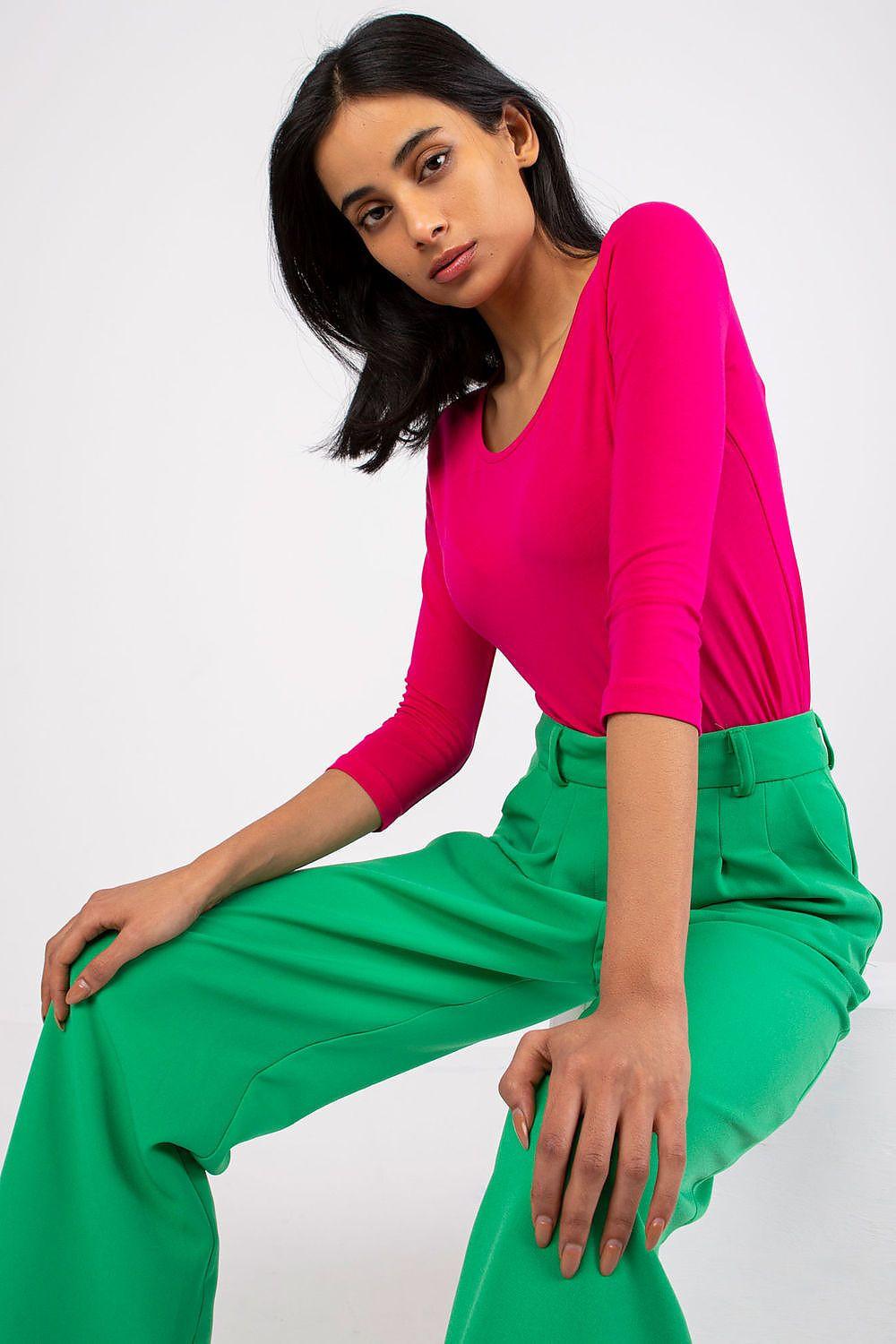 Long-sleeve blouse in hot pink with round neck and fitted waist