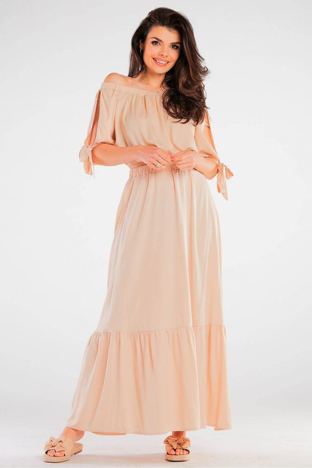 Beige off-shoulder tiered blouse with puff sleeves and ribbon ties