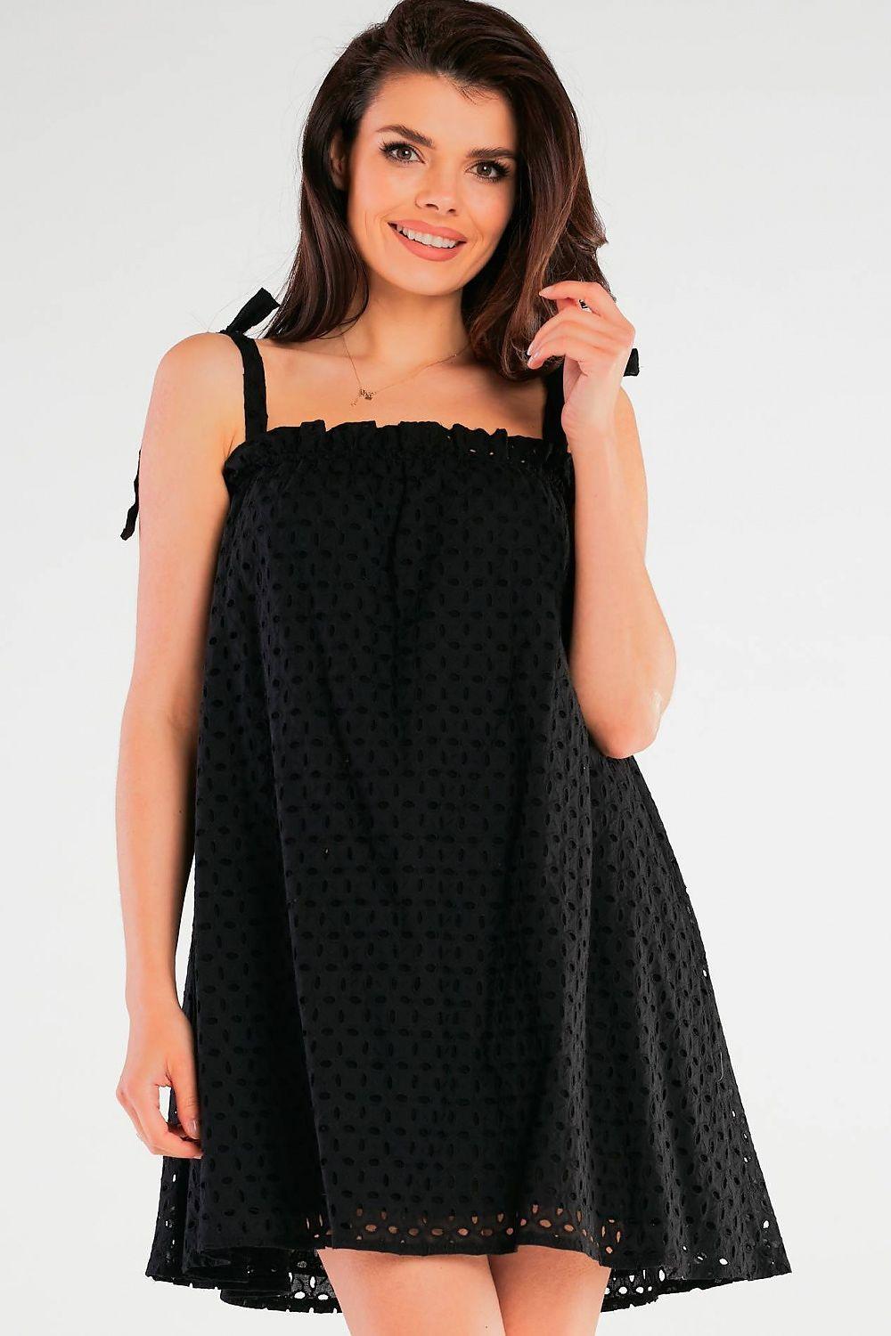 Black daydress, square neckline with ruched trim, sleeveless tie straps, flared skirt
