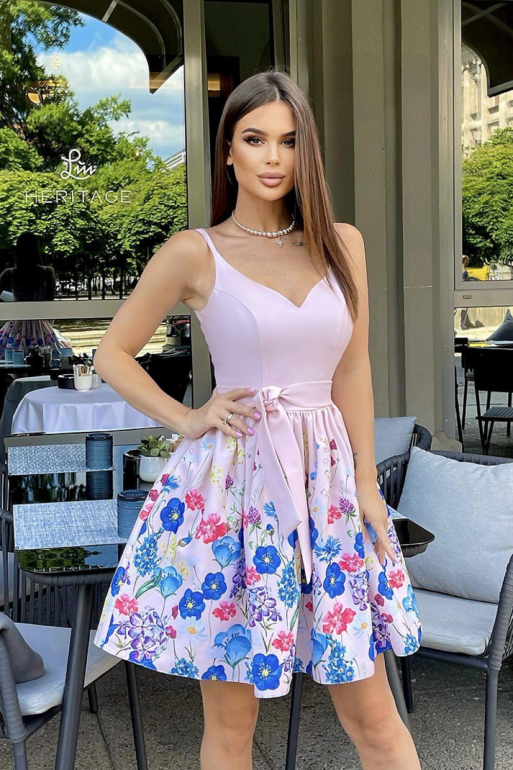 Bicotone cocktail dress with pink V-neck bodice and pastel floral skirt, sleeveless fit-and-flare