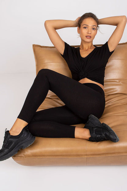 Black V-neck short-sleeve T-shirt with relaxed drape and curved hem.