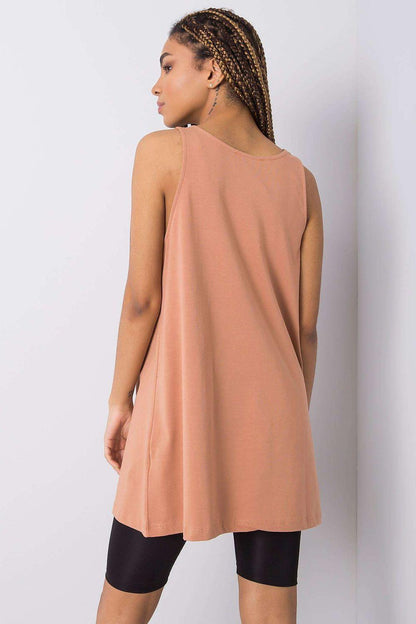 Sleeveless fancy top, back view, peach with wide armholes