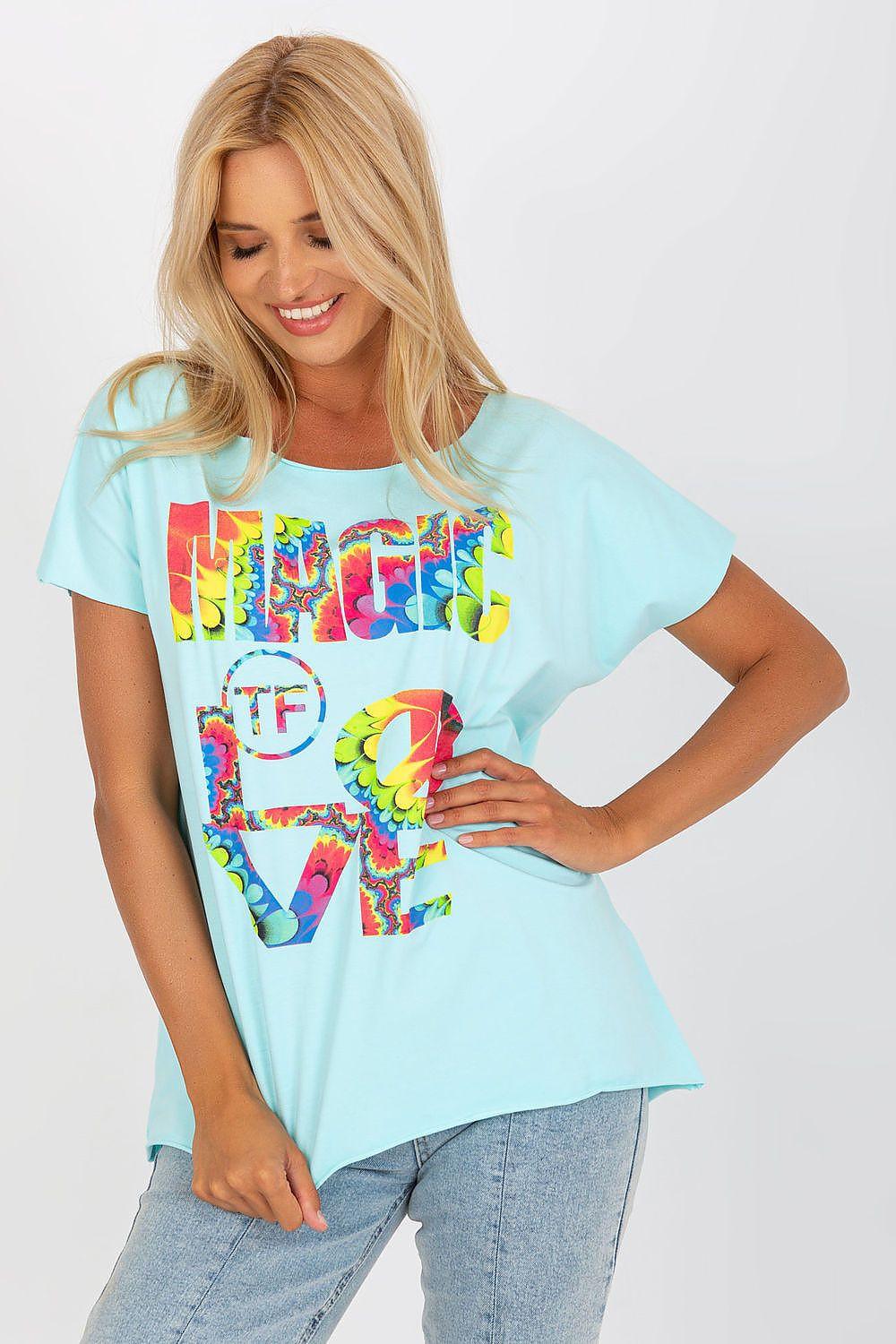 Light blue short-sleeve cotton blouse with colorful graphic print, front view