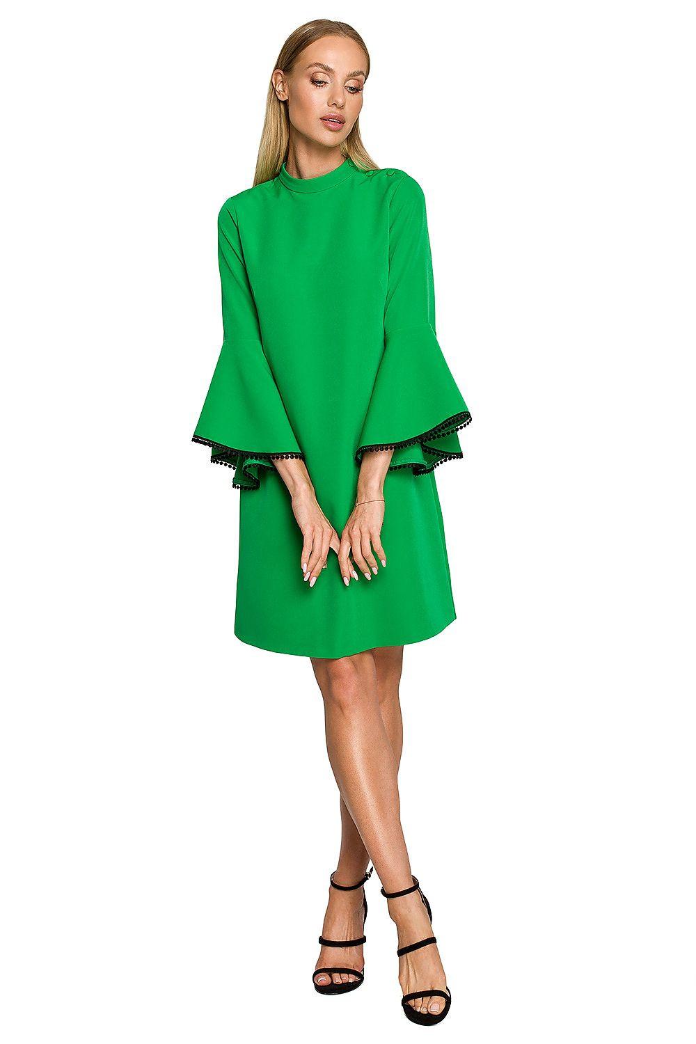 Green daydress with wide bell sleeves and scalloped trim at cuffs and hem