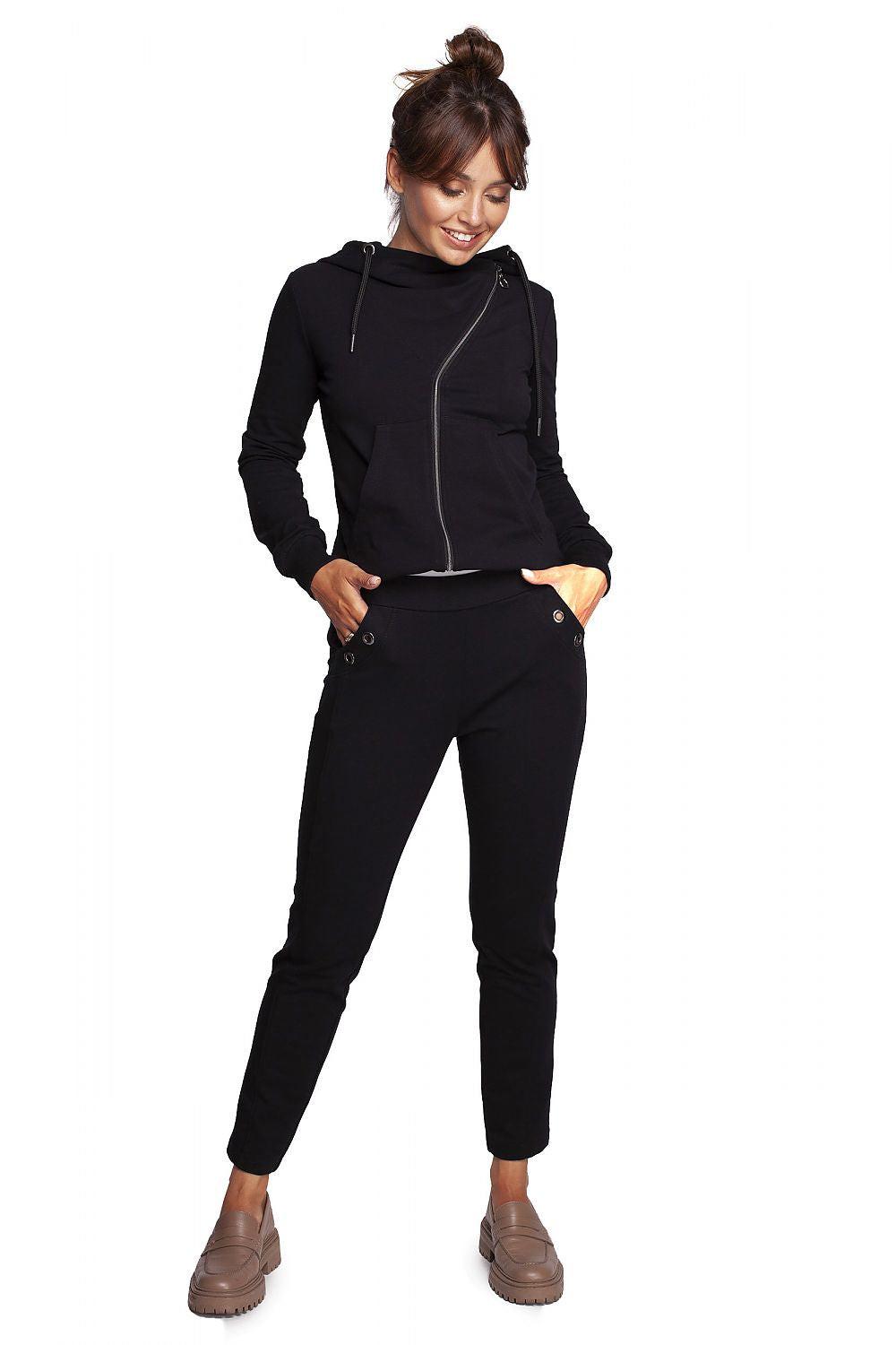 Women’s black tapered trousers with ankle cuffs and side pockets