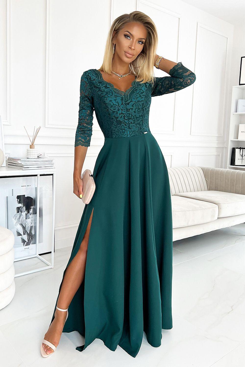 Dark green maxi lace dress with lace bodice, 3/4 sleeves, bateau neckline, front slit.