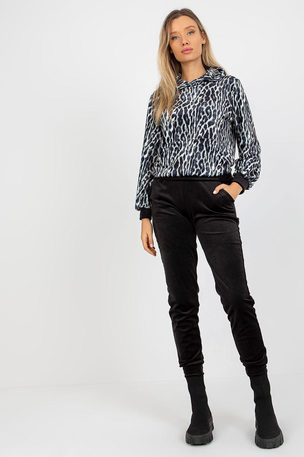 Animal-print velour hoodie and black pants set with long sleeves and jogger fit