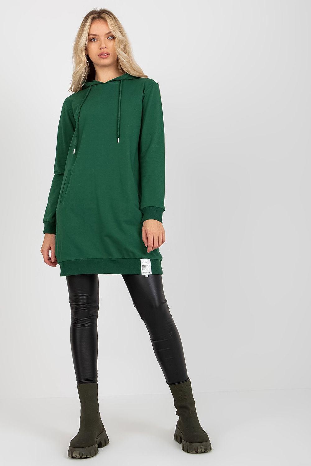 Green hoodie daydress with long sleeves, front pocket, and drawstring hood.