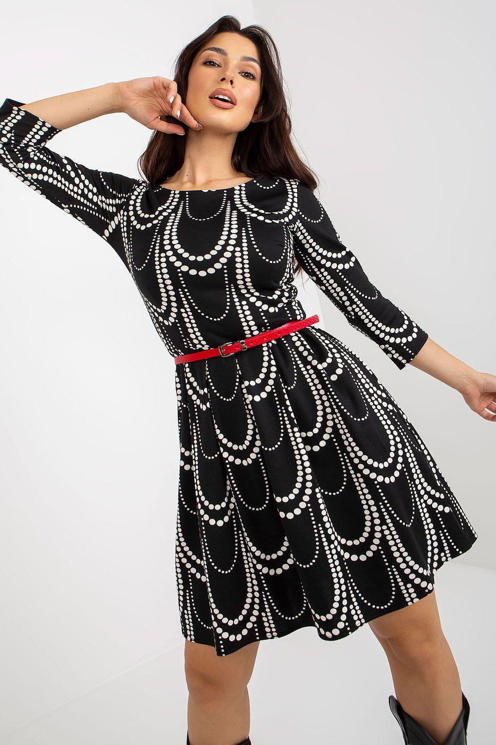 Lakerta daydress, black with silver scallop pattern and red belt, long sleeves