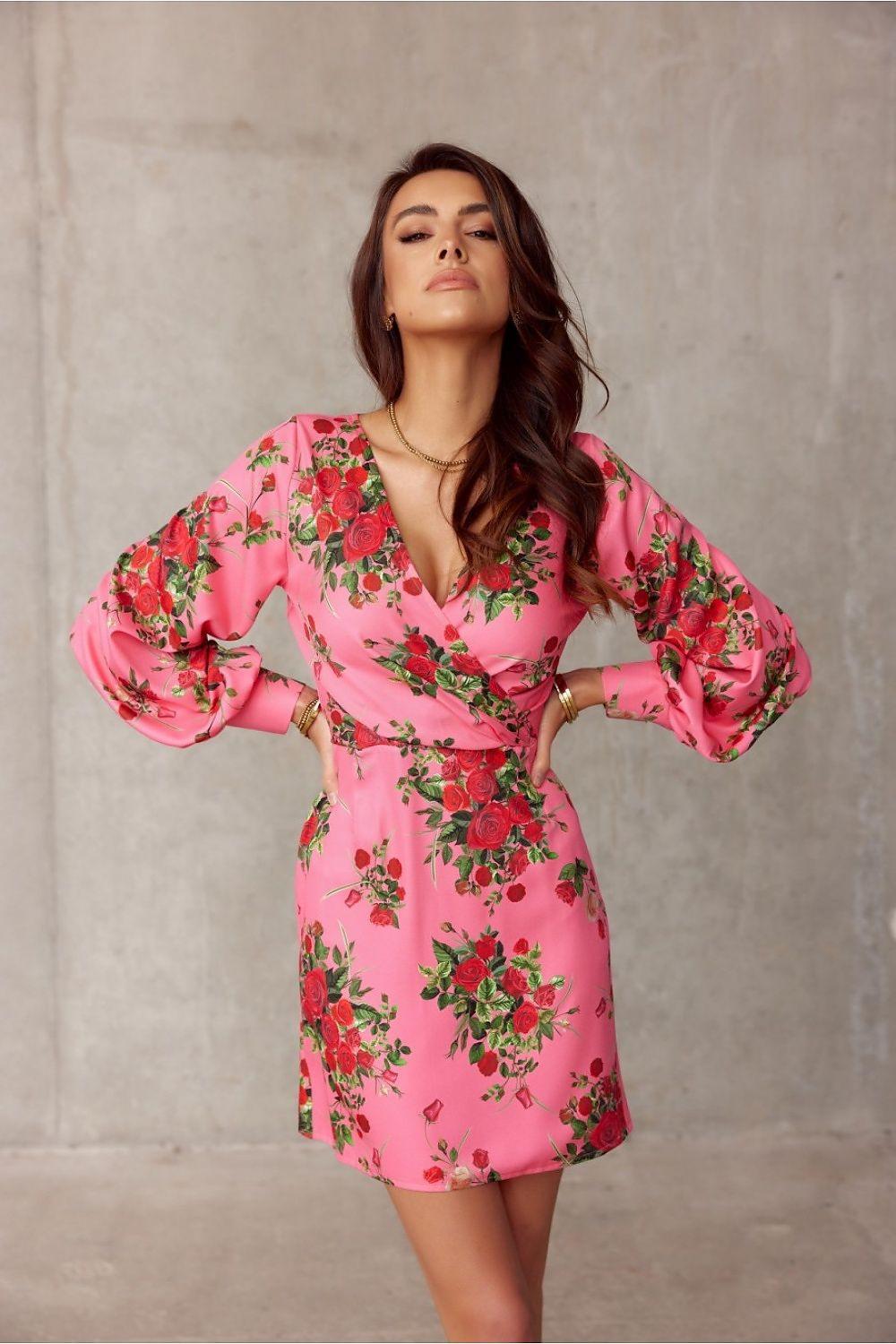 Pink floral cocktail dress with V-neck and balloon sleeves, fitted shift silhouette