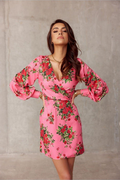 Pink floral cocktail dress with V-neck and balloon sleeves, fitted shift silhouette