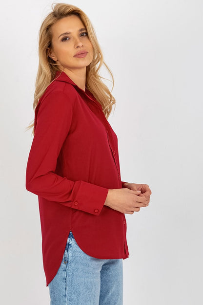 Women's long-sleeve button-up shirt in red with collar and buttoned cuffs