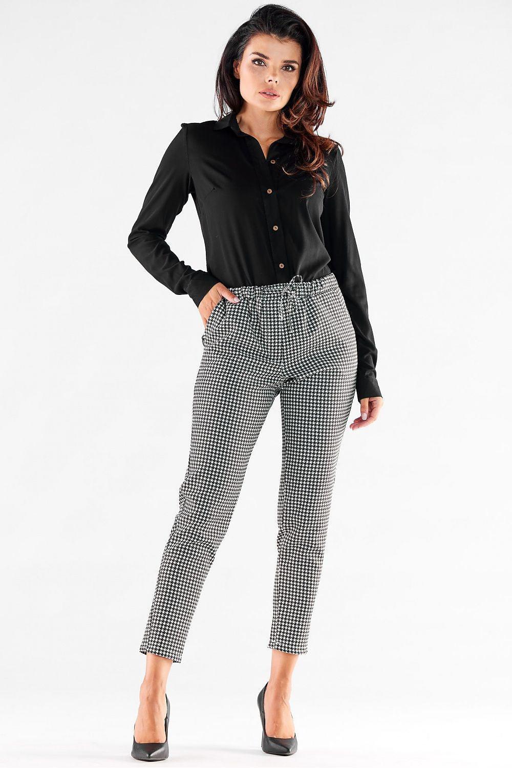 Women's houndstooth trousers with slim leg and ankle length
