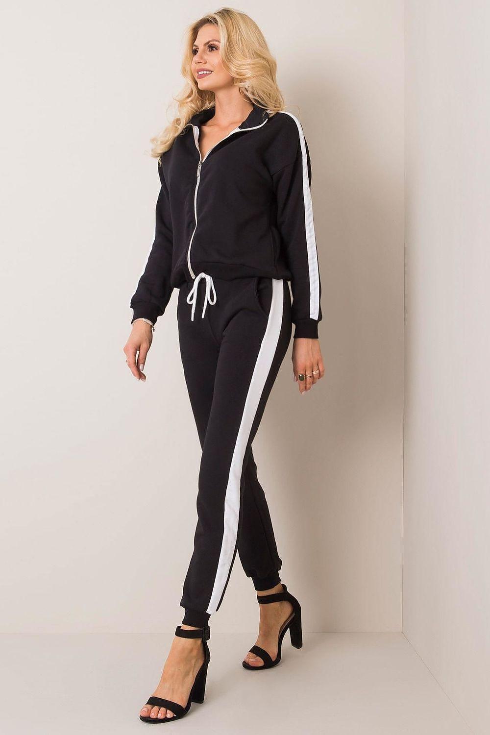 Black sweatshirt and jogger set with contrast piping, zip hoodie and drawstring waist.