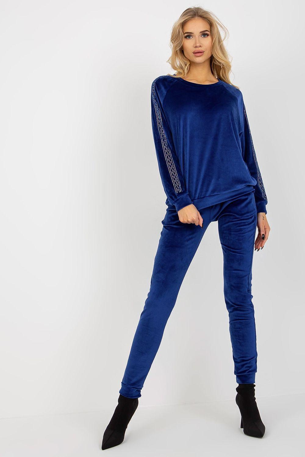 Blue velour set with long-sleeve top and matching jogger pants, rhinestone sleeve trim.