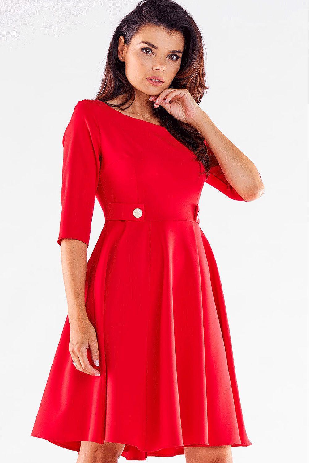 Red day dress with 3/4 sleeves, waist buttons, and flared knee-length skirt
