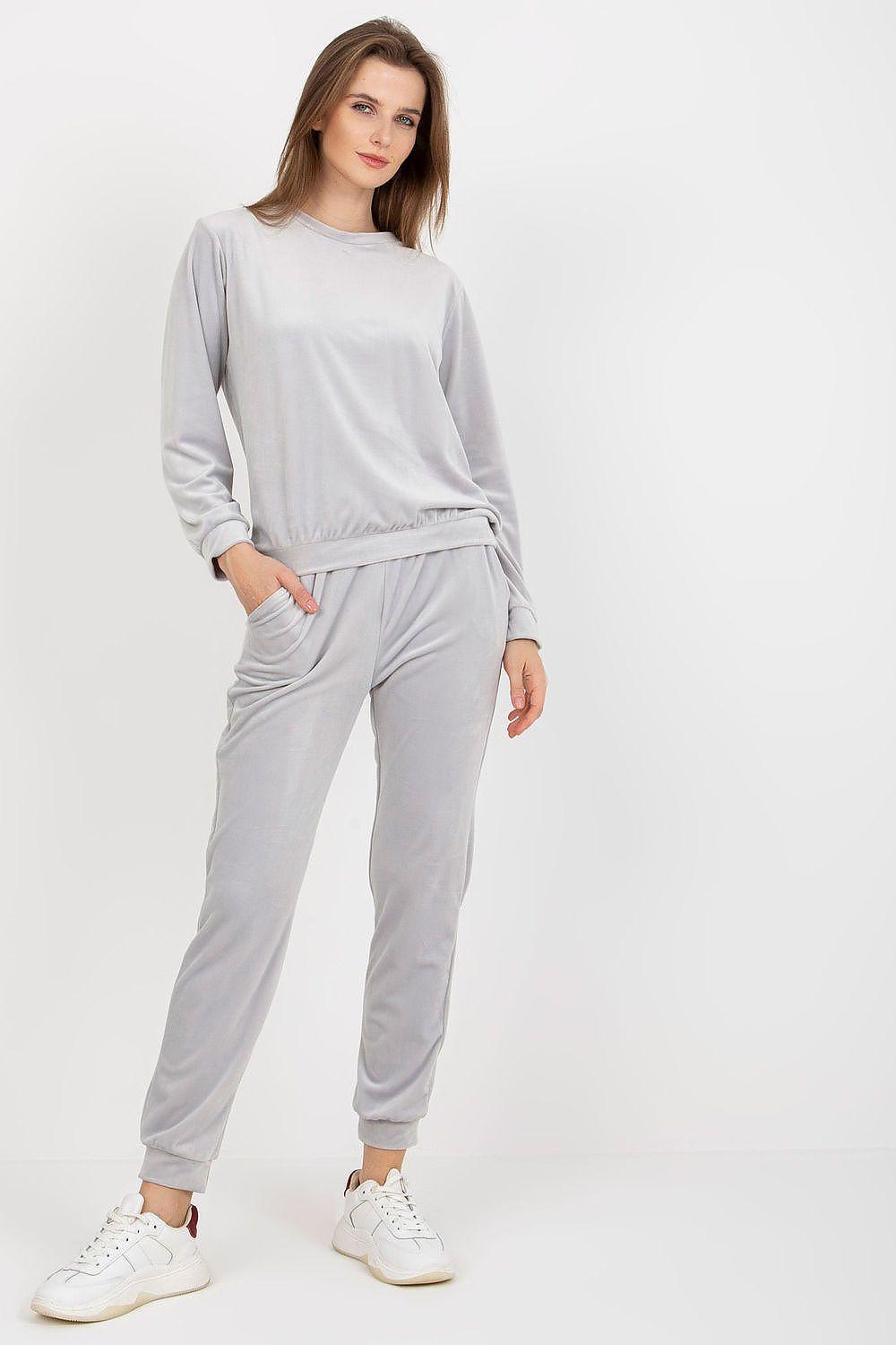 Grey velour loungewear set with long-sleeve top and jogger pants, relaxed fit