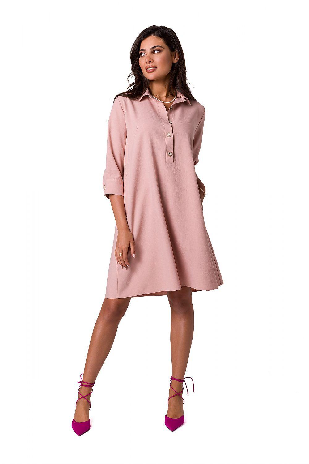 Pink daydress with button placket, 3/4 sleeves, and knee-length A-line skirt