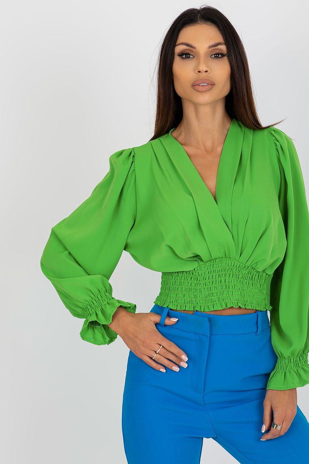 Green blouse with V-neck, long puff sleeves, and smocked waist hem, cropped style