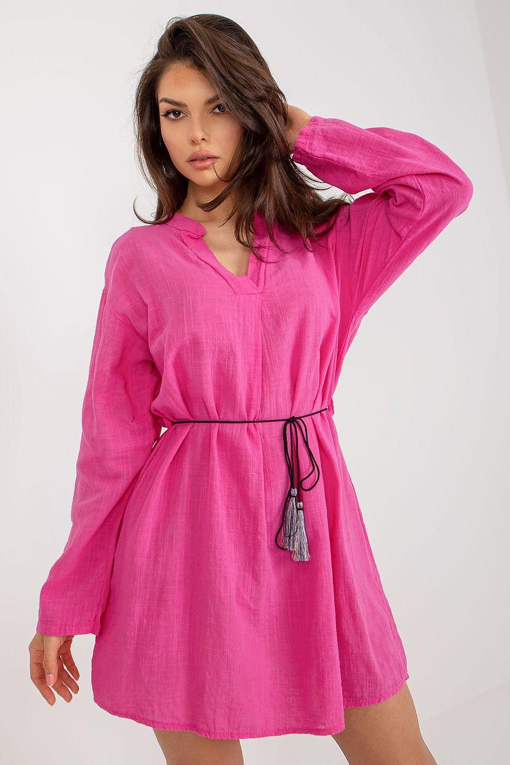 Pink long-sleeve daydress with V-neck and drawstring waist, tassel tie detail