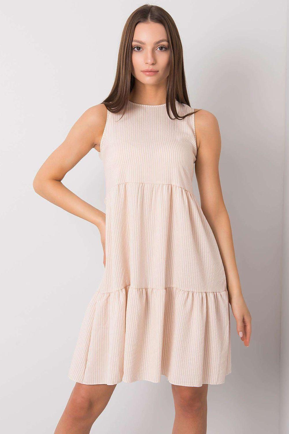 Beige sleeveless tiered daydress with round neckline and ribbed texture