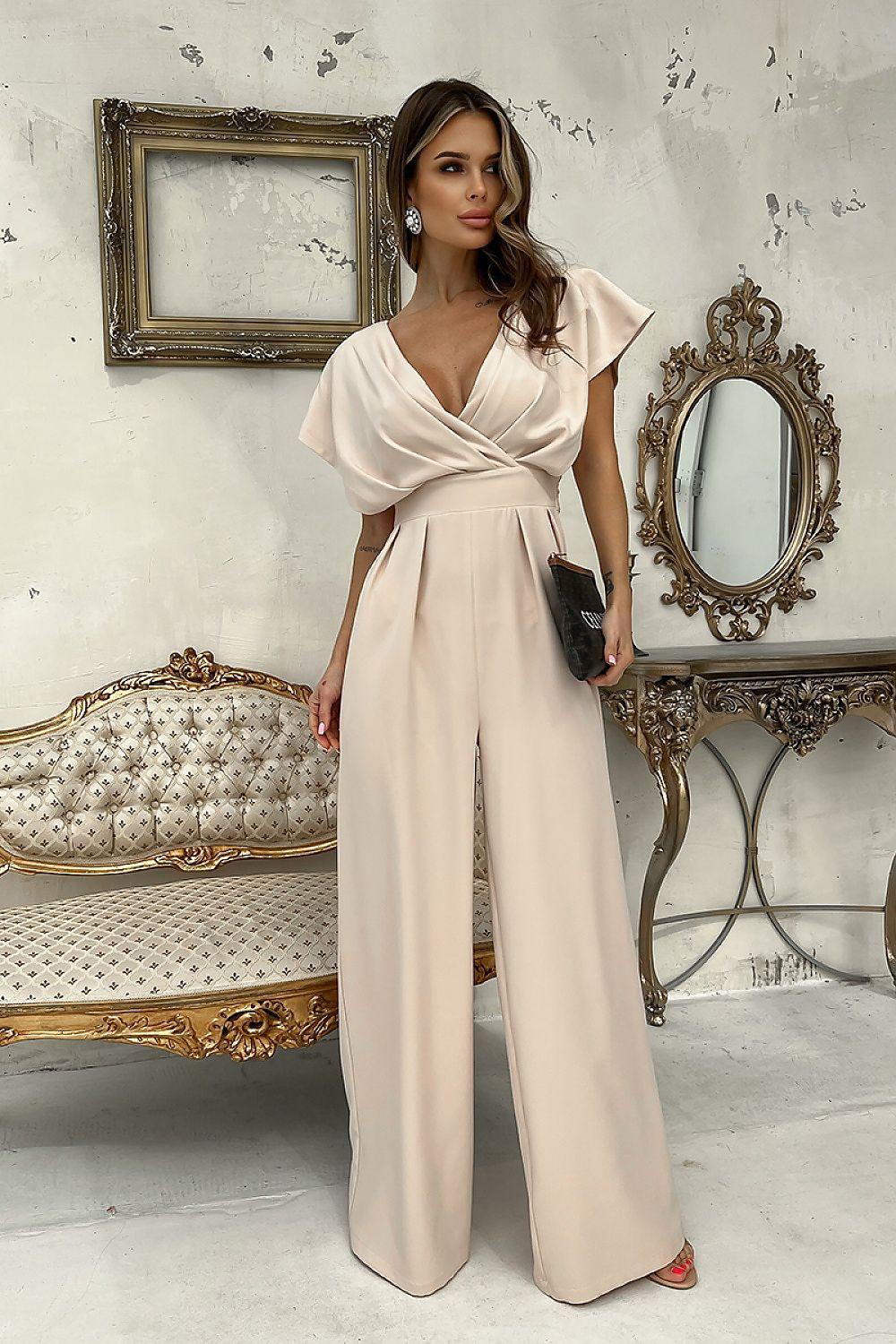 Light beige wrap jumpsuit with V-neck, tied waist, and wide legs
