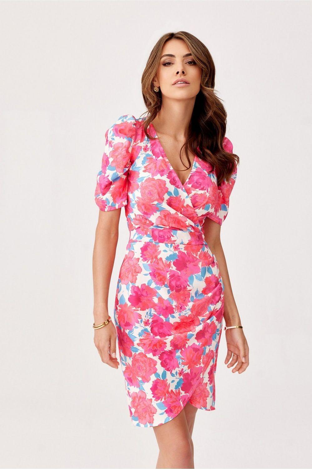 Floral cocktail dress with V-neck wrap and short puff sleeves, knee-length pink and blue print.