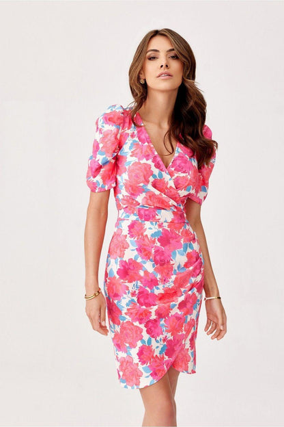 Floral cocktail dress with V-neck wrap and short puff sleeves, knee-length pink and blue print.