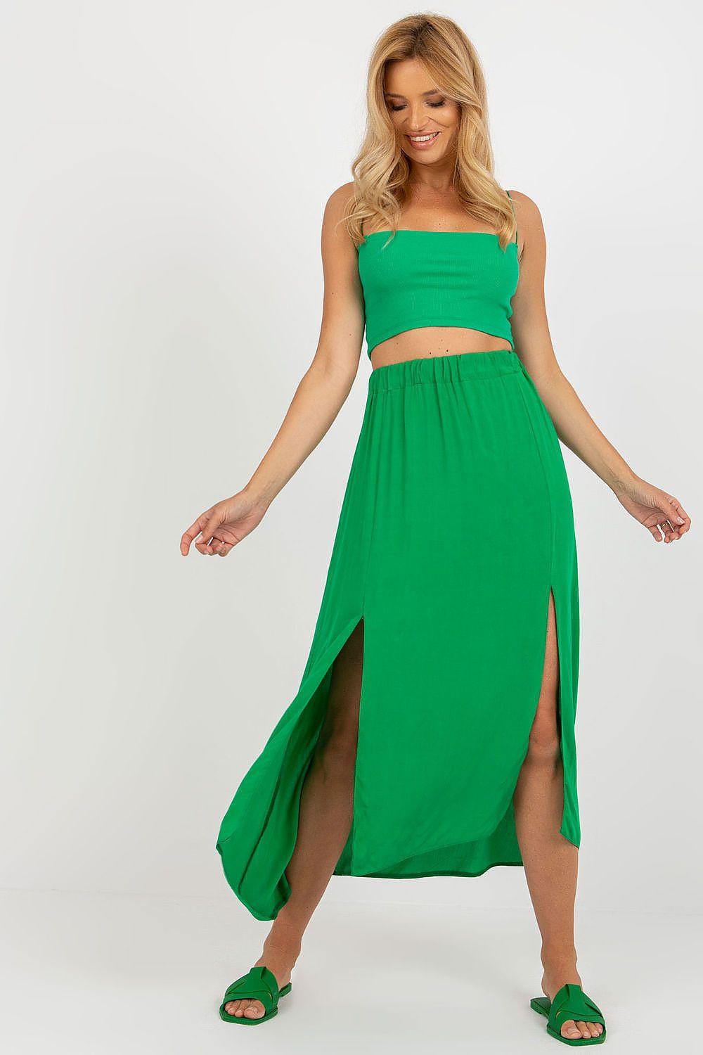 Green asymmetrical midi skirt with side slits, gathered waist and flowing silhouette