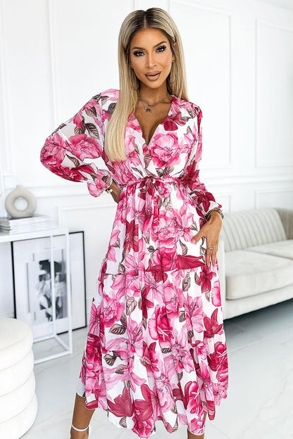 Pink floral cocktail dress with V-neck wrap, long puff sleeves, and tied waist