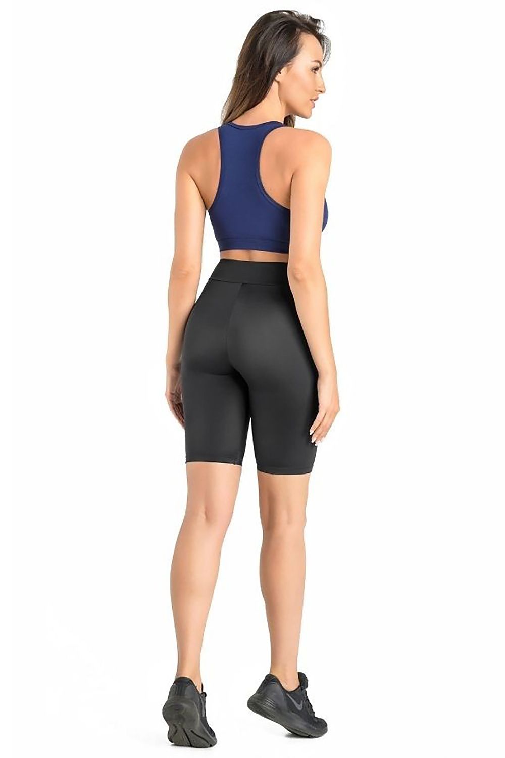 Black high-waist short leggings, side view, seamless fitted stretch
