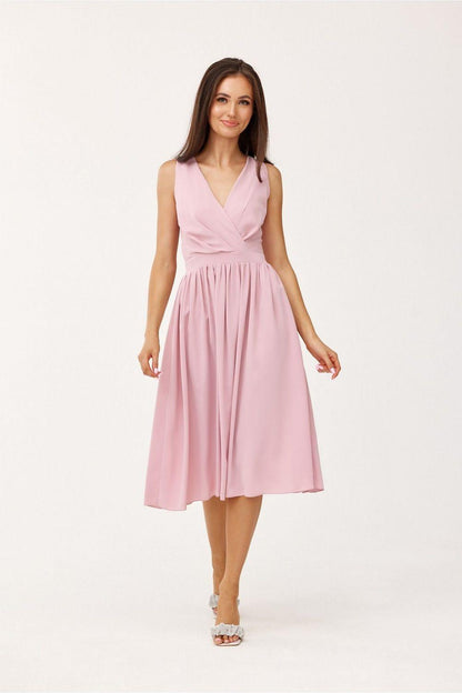 Pink V-neck sleeveless midi cocktail dress with wrap-style bodice and pleated skirt, front