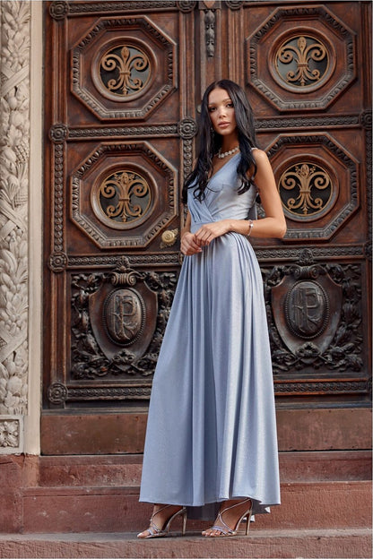 Light blue sleeveless maxi dress with V neckline and side slit, gathered bodice